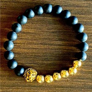 Gold and black lion bracelet